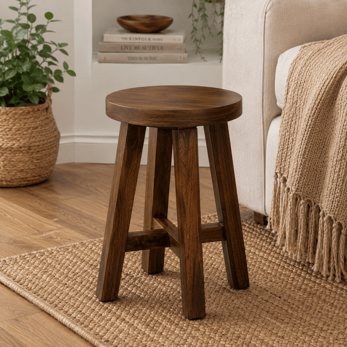Handcrafted solid acacia wood accent stool with a round wooden seat and walnut finish by Bombay Home Decor LLC.
